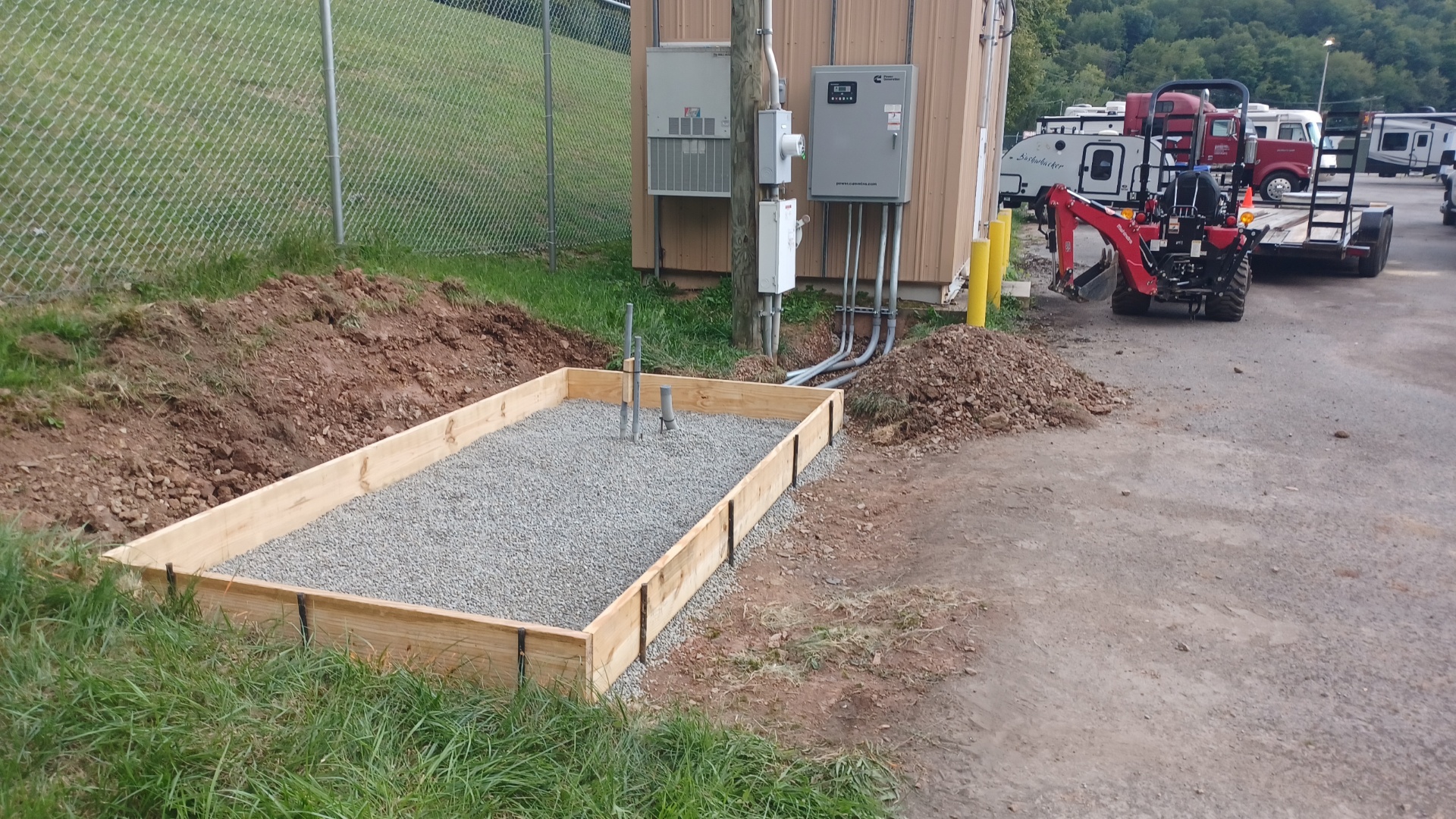 A constructed pad made to support a generator installation.